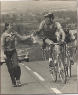 <h5>Handing the Sponge</h5><p>Handing Bob a sponge at top of Brill Hill, during the Wembley road race, which he went onto win. </p>